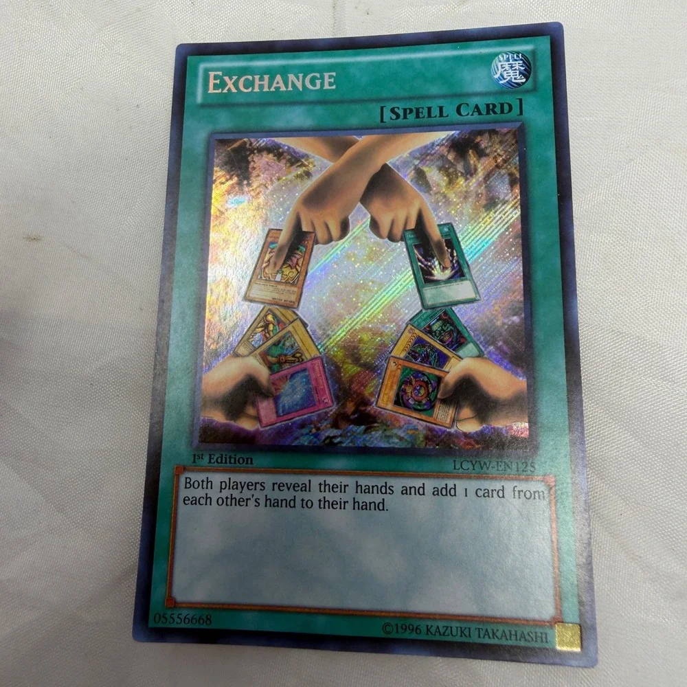 Yu-Gi-Oh Exchange LCYW-EN125 Secret Rare 1st Edition Spell Card Yugis World